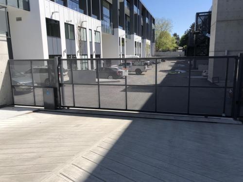 TG253 Sliding gate-Aluminum perforated sheet in Vancouver Ironworks