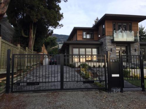 TG472 Double swing gate and man gate aluminum pickets with rings in Vancouver